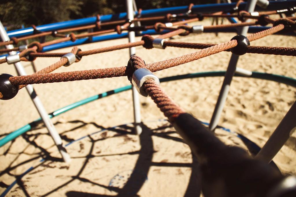 Developer coding full-stack web application on dual monitor setup