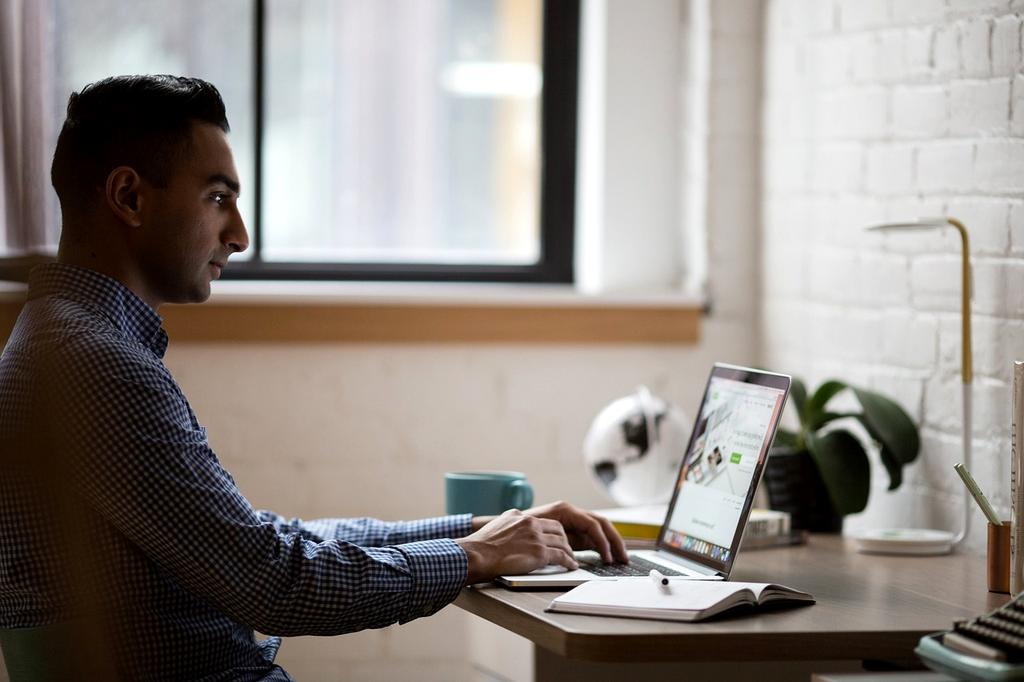 Programming code on multiple monitors in modern development workspace