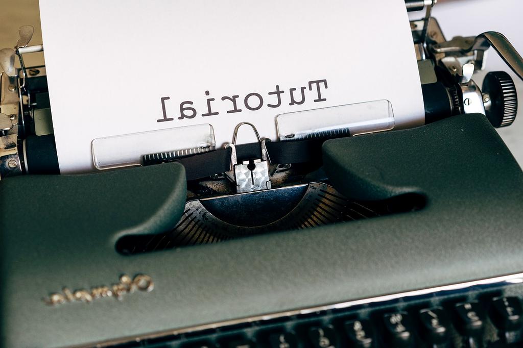 Video tutorial on coding displayed on a laptop screen